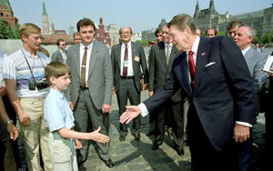 Internet image of photograph of Ronald Reagan on a trip to russia. 1st left (stripe top) is believed to be Vladimir Putin Source: pete souza / radio free europe